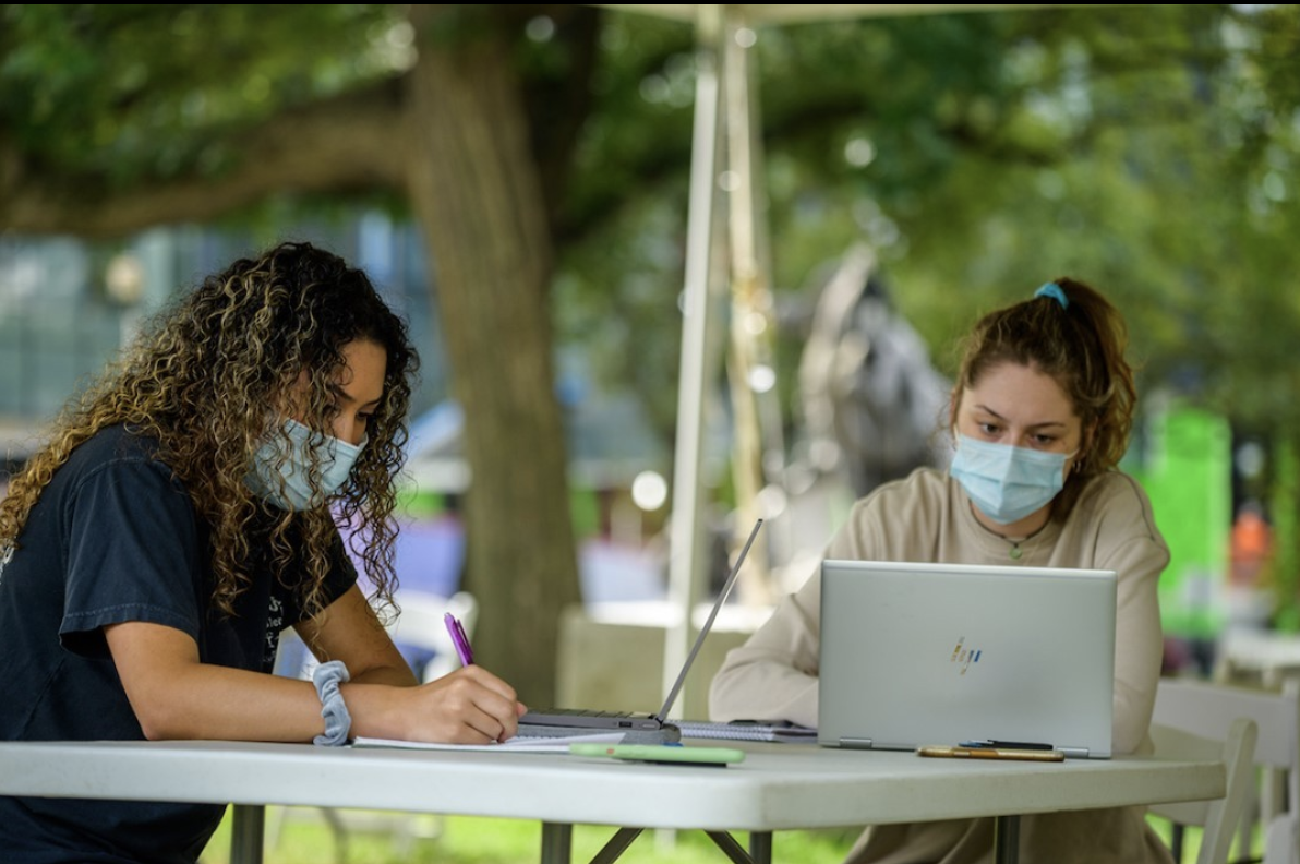 Stevens students in masks on campus